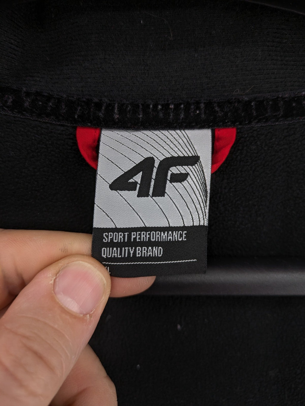 4F red softshell jacket with fleece lining and Aquatech 3000 logo detail.