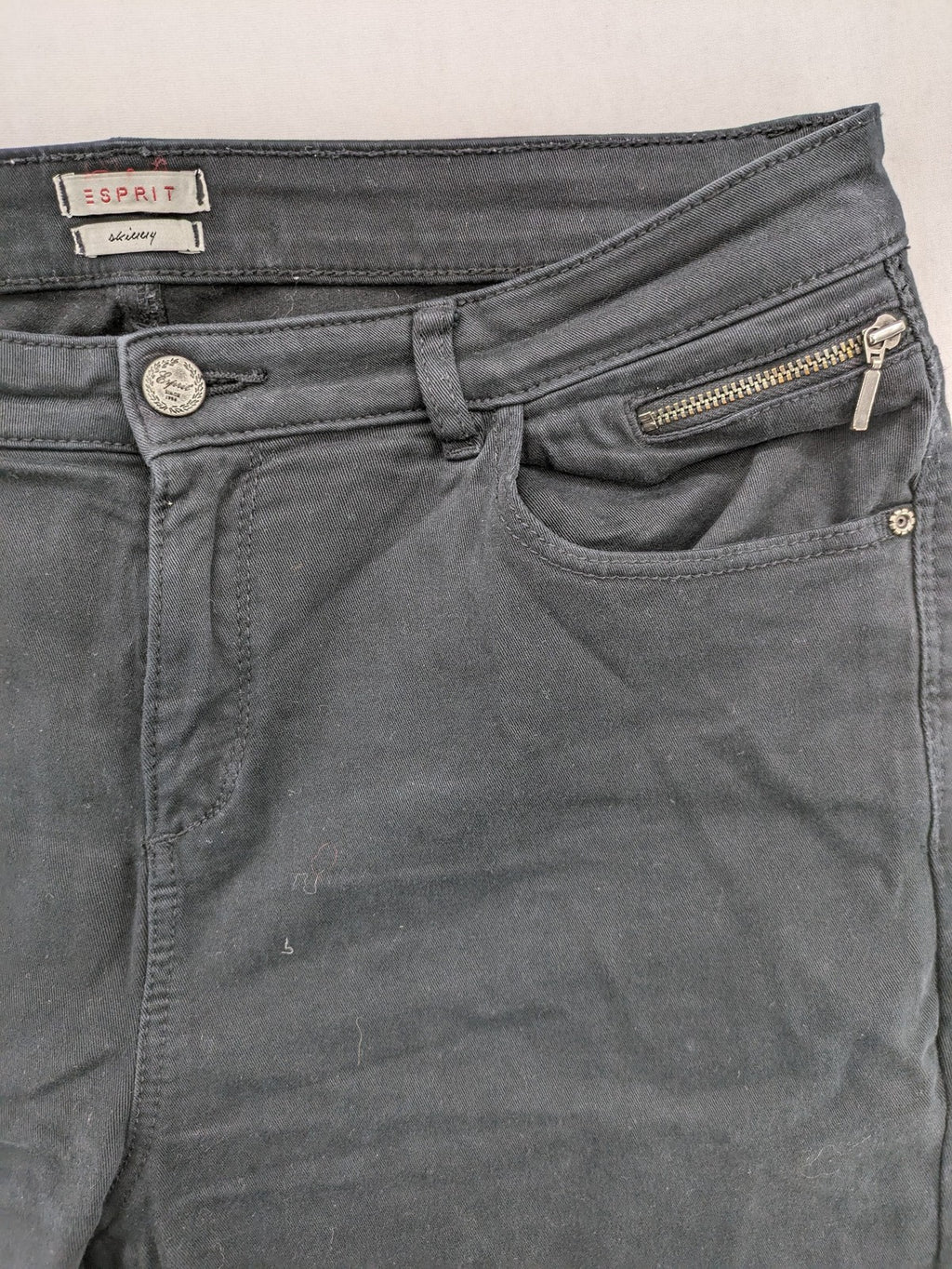 Esprit black skinny jeans with zipper details and cotton-stretch material.