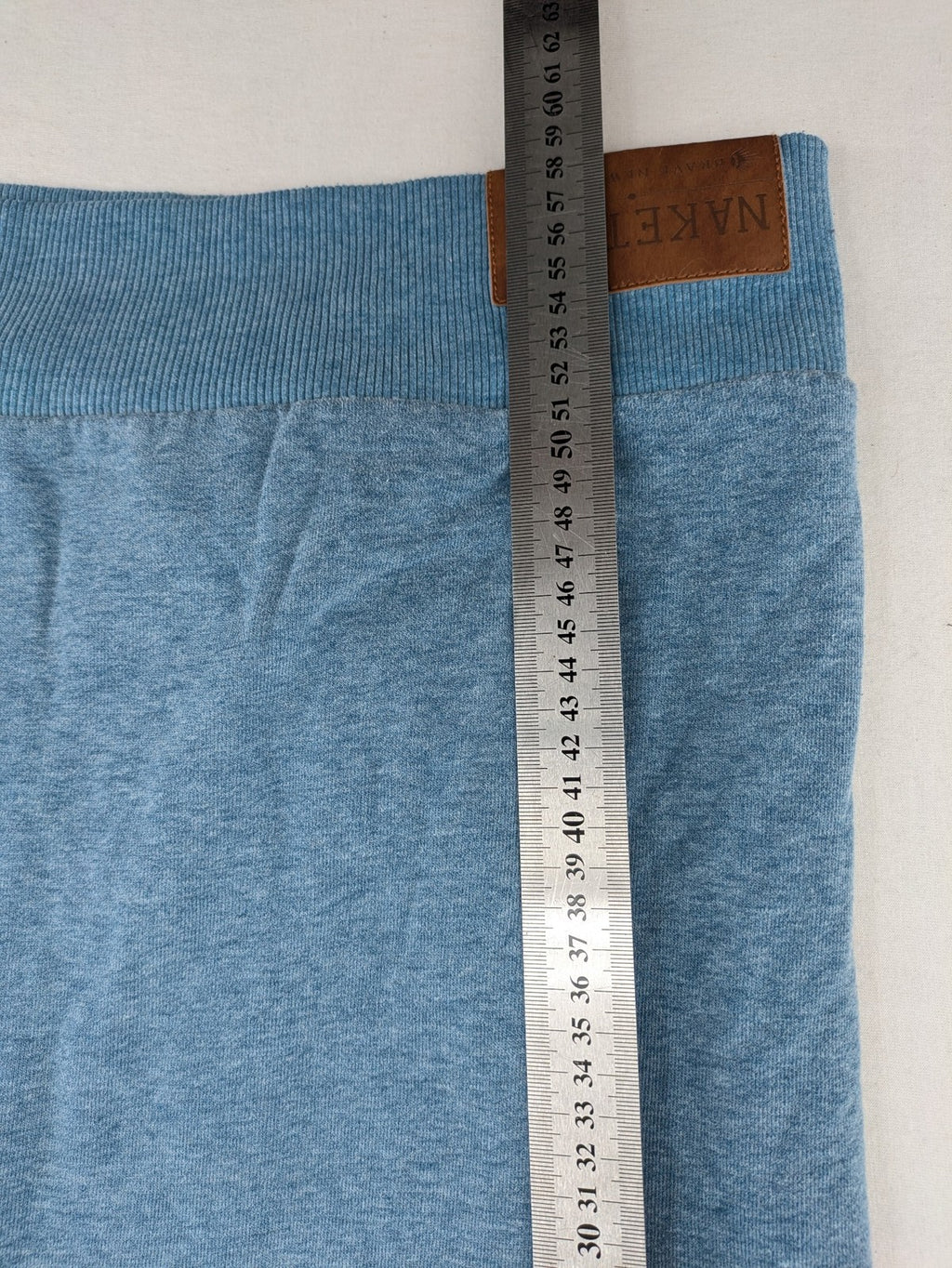 Naketano blue turtle neck jumper with unique collar and artistic leather details