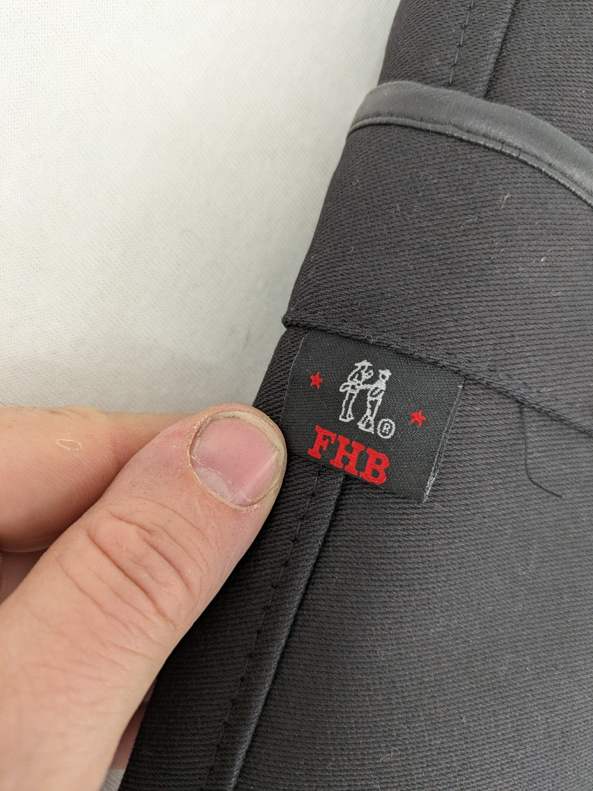 FHB hunting pants grey with double zipper and leather reinforcements, made from 100% cotton.