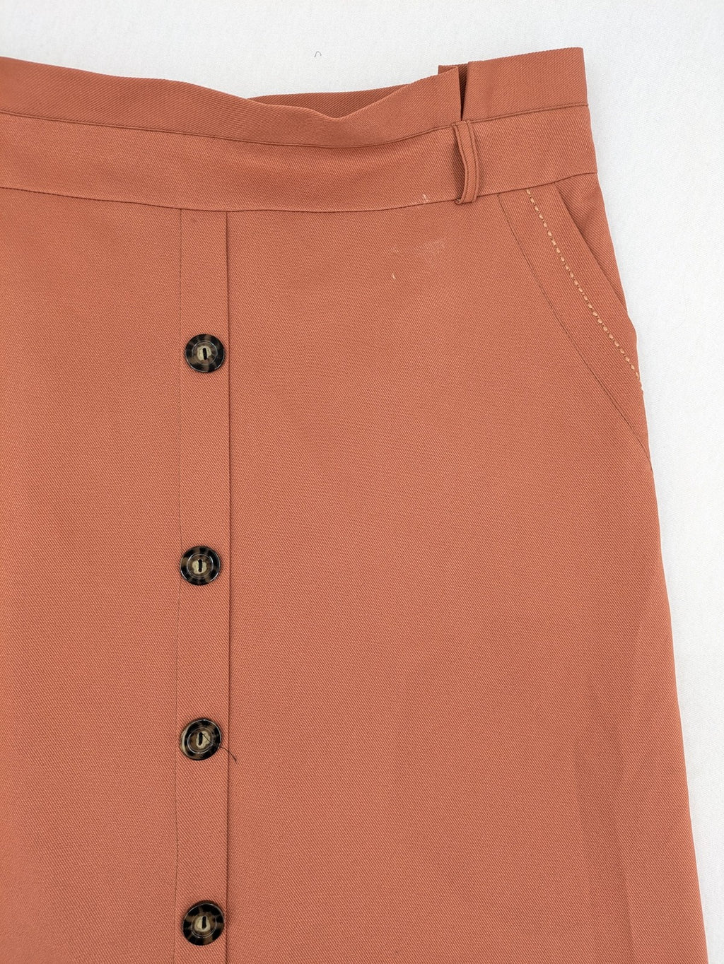 Moda orange long skirt A-line cut with front button placket and belt loops.
