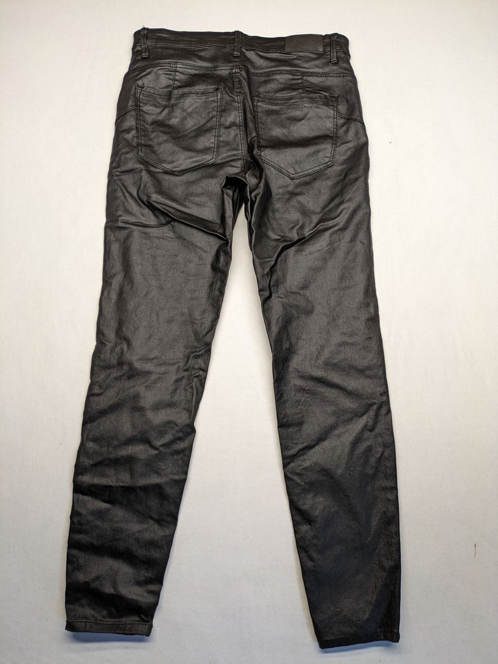 Stradivarius black coated straight jeans with leather-like finish and stretchy material.