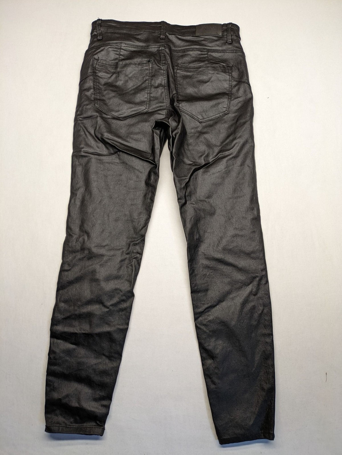 Stradivarius black coated straight jeans with leather-like finish and stretchy material.