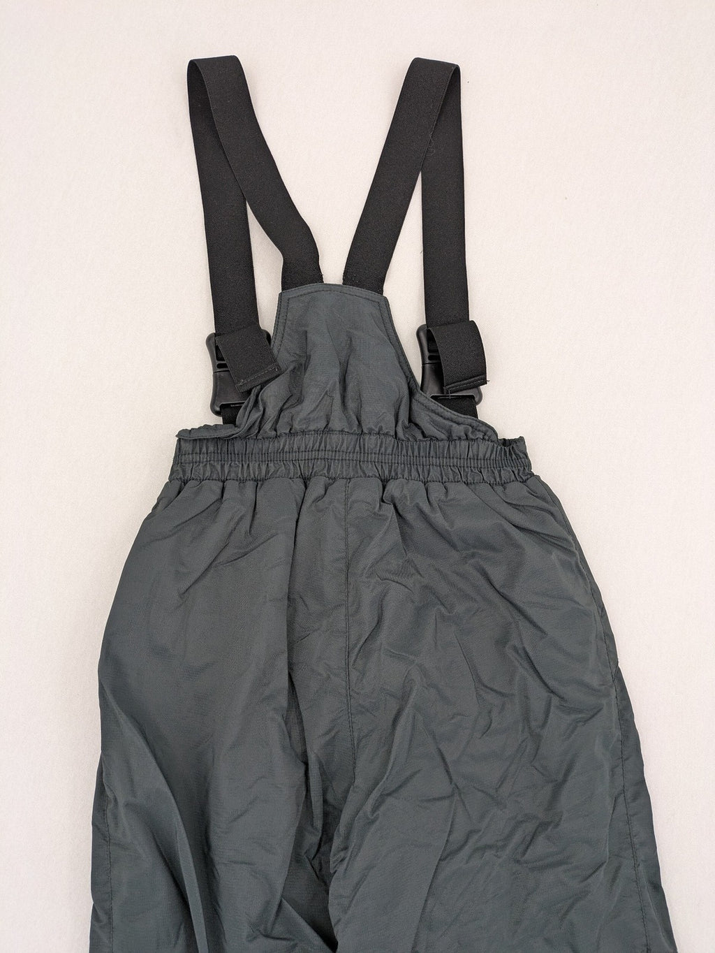PROLINE grey winter ski pants with adjustable straps and insulated durable material.