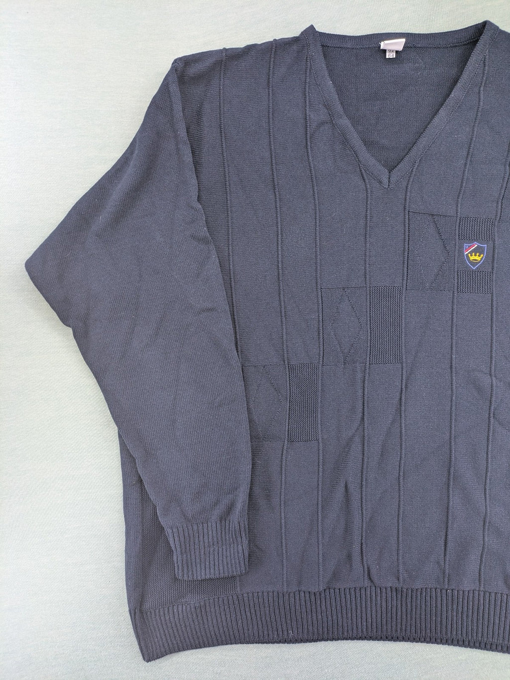 thomas lloyd navy turtle neck jumper with textured knit and embroidered crest logo