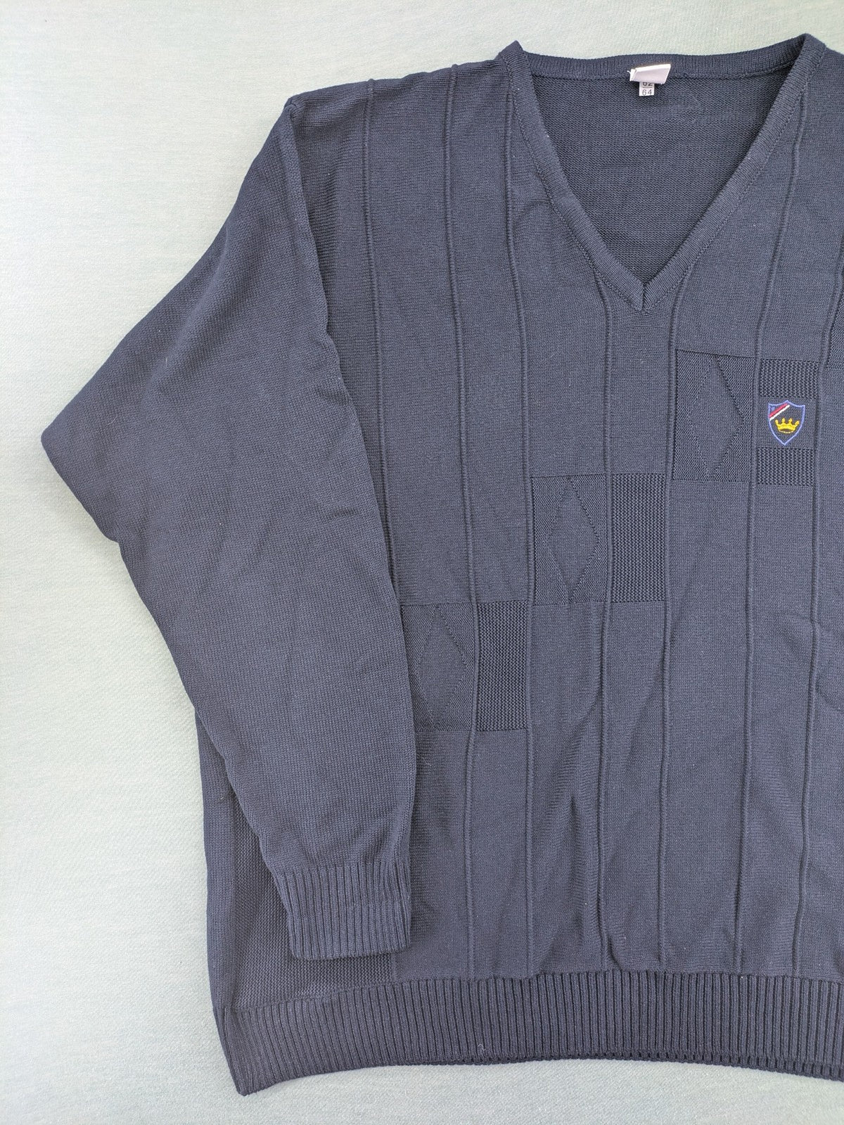 thomas lloyd navy turtle neck jumper with textured knit and embroidered crest logo