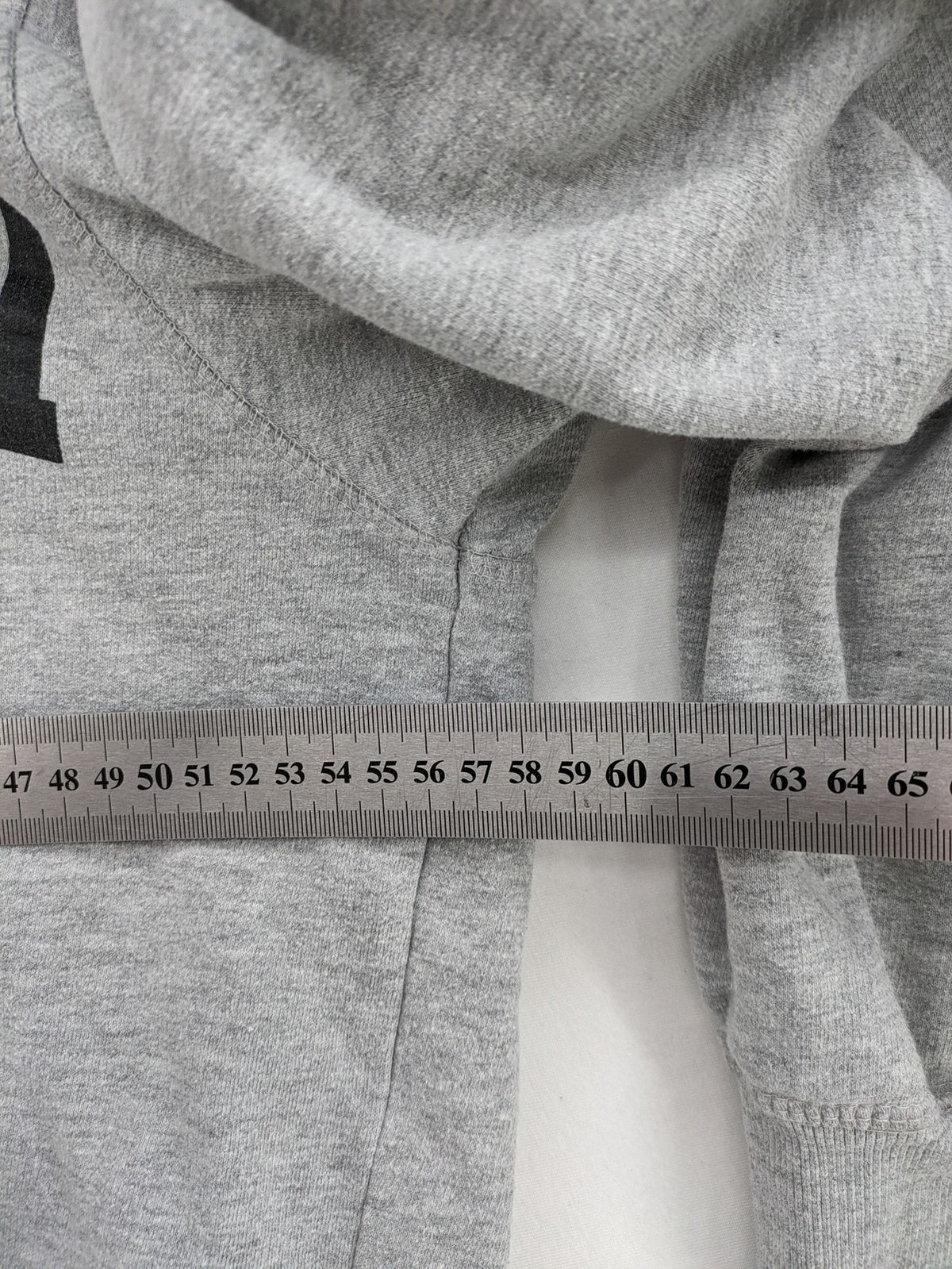 Uncle Sam grey hoodie with logo print, kangaroo pocket, and drawstring hood.