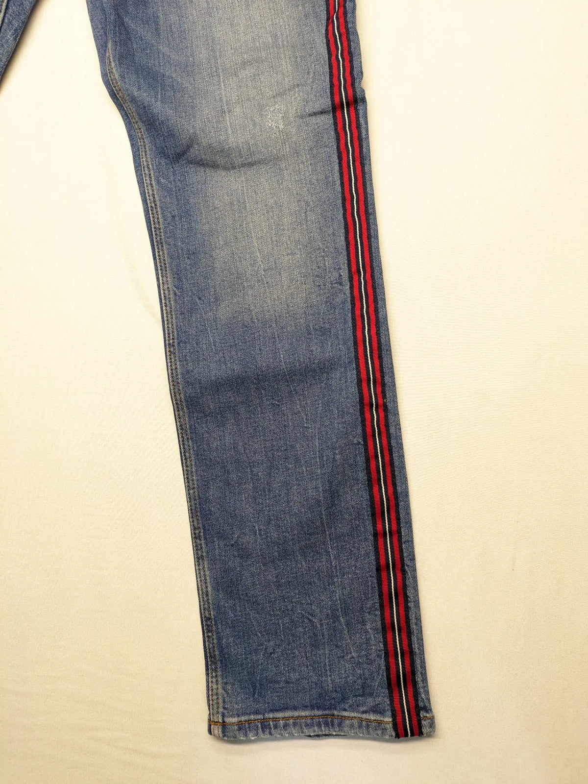 s.Oliver blue straight jeans with red and white side stripes, soft cotton blend material