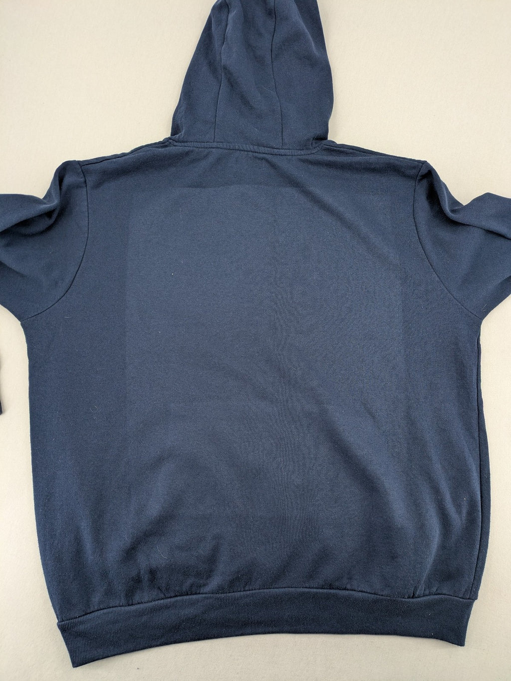 Pornhub zip-through hoodie navy blue with iconic logo on chest, cotton-polyester blend.