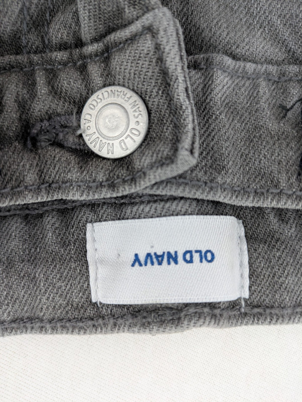 Old Navy navy straight jeans with adjustable waistband and classic 5-pocket design.