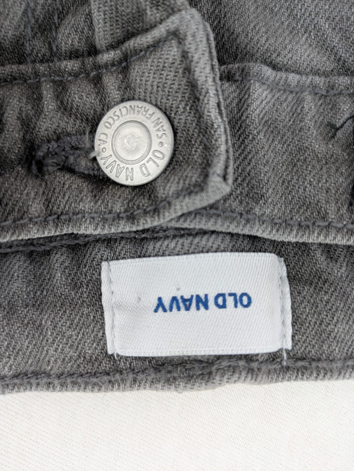 Old Navy navy straight jeans with adjustable waistband and classic 5-pocket design.