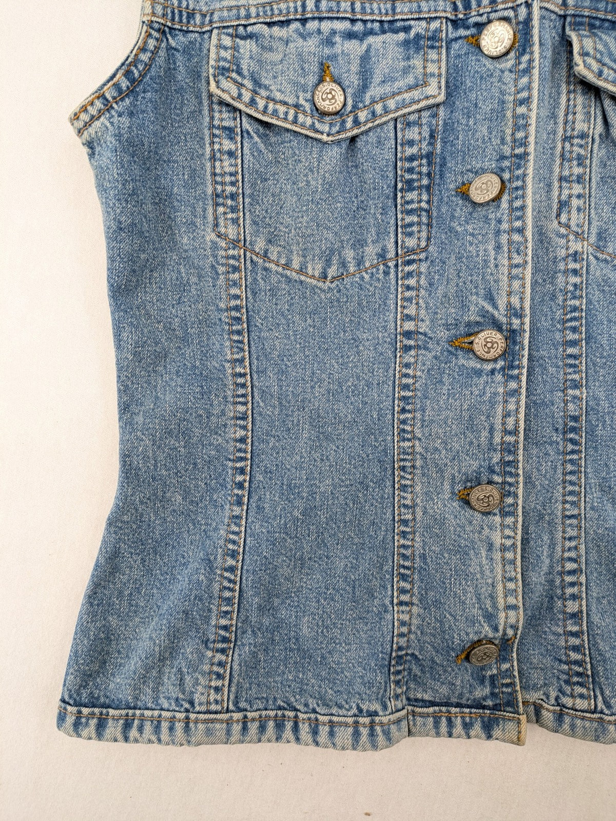 s.Oliver blue denim vest with button closure, pointed collar, and breast pockets.