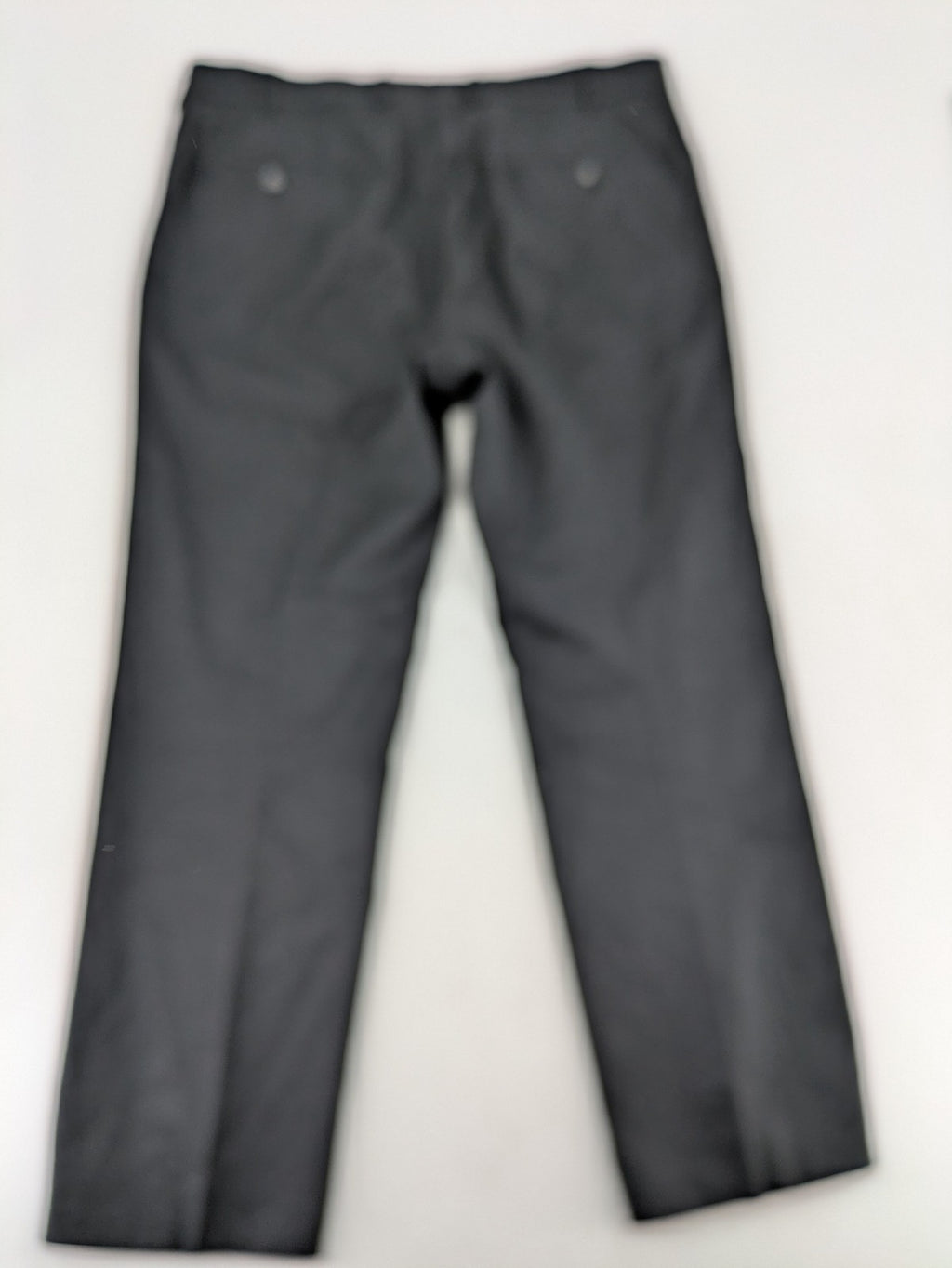 Desch grey suit pants with subtle pinstripe pattern and flat front design.