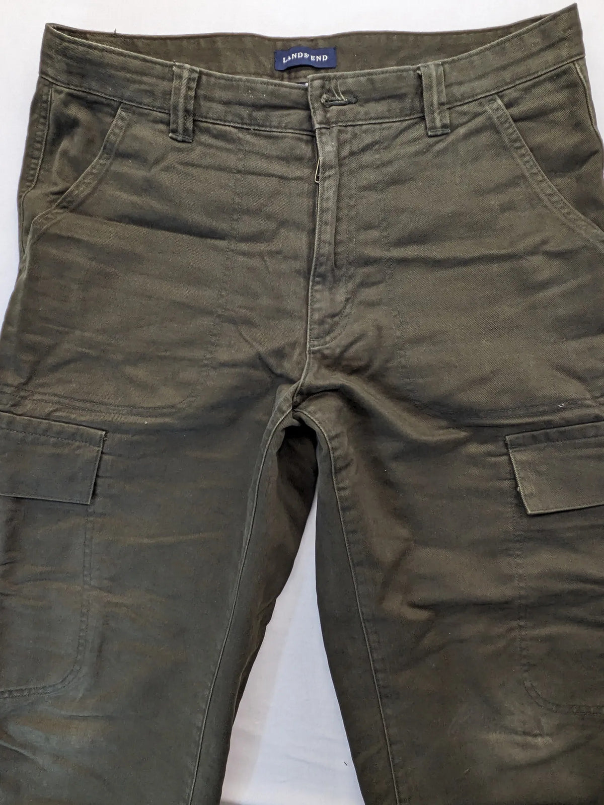 Lands' End green cargo pants with plaid flannel lining and traditional fit design.
