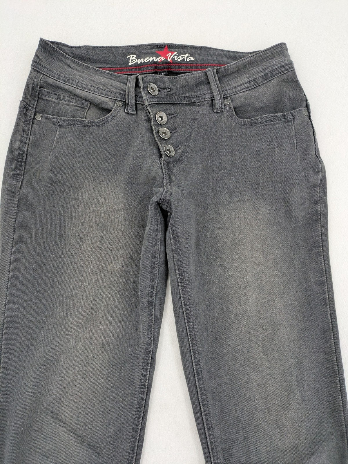 Buena Vista grey skinny jeans with button fly and stretch denim material.