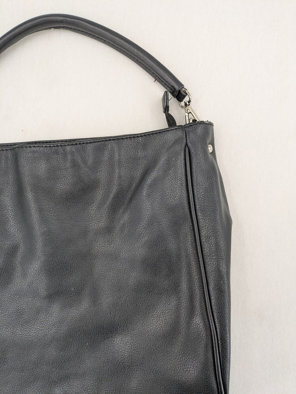 David Jones black hobo handbag pebbled PU leather with silver hardware and zipper closure.
