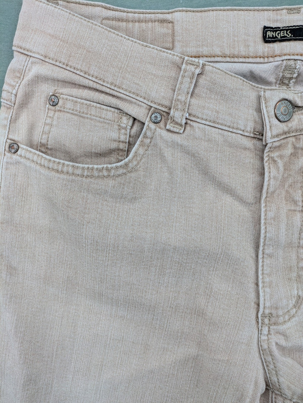 Angels beige straight leg jeans with five-pocket design and zipper button closure.