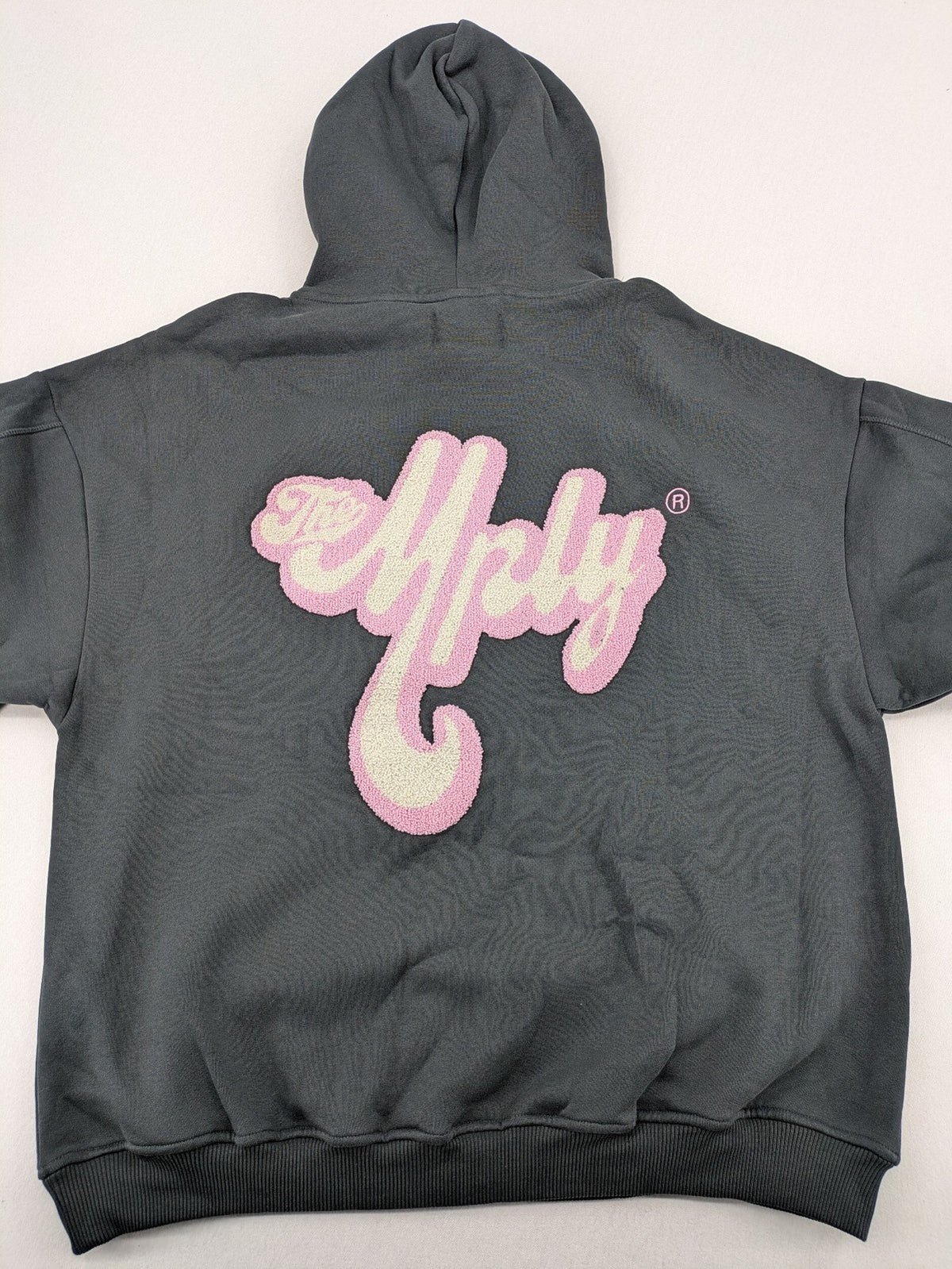 Multiply pink zip-through hoodie with large chenille logo backprint and front logo embroidery.