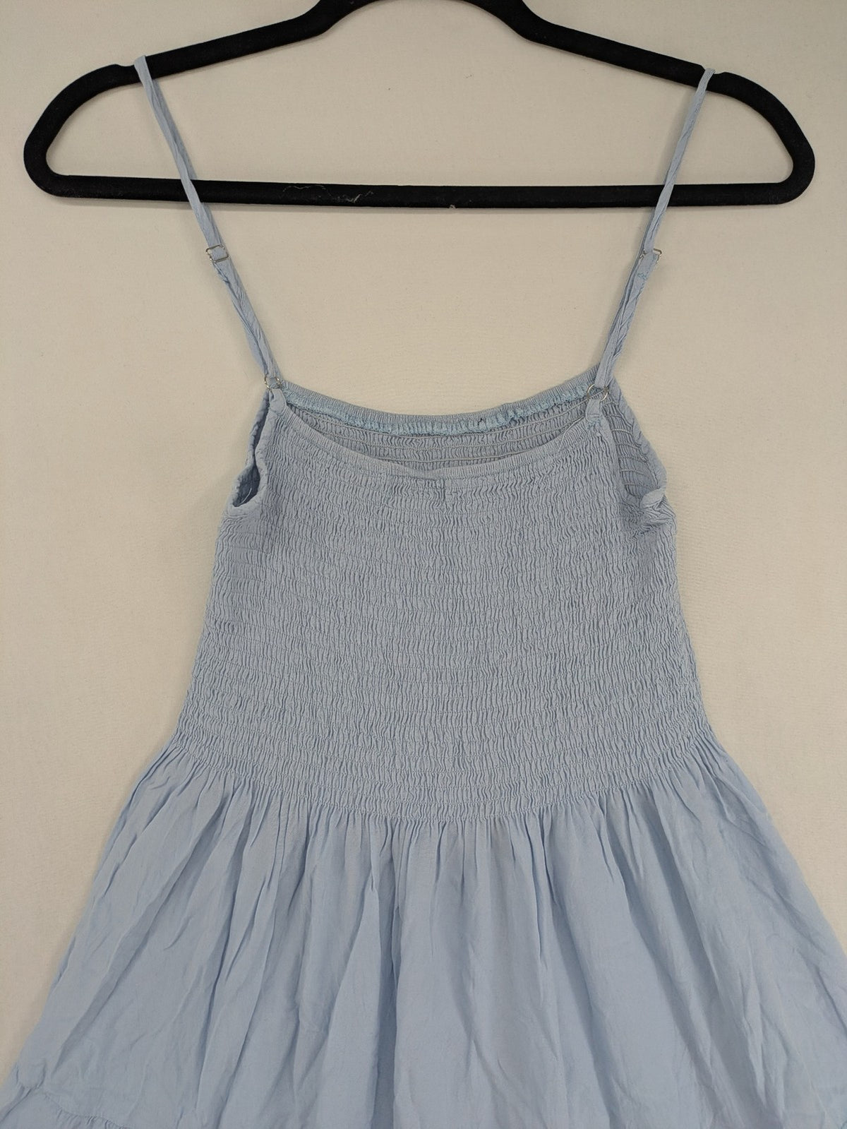 Ebelove blue summer dress with smocked bodice and adjustable spaghetti straps.