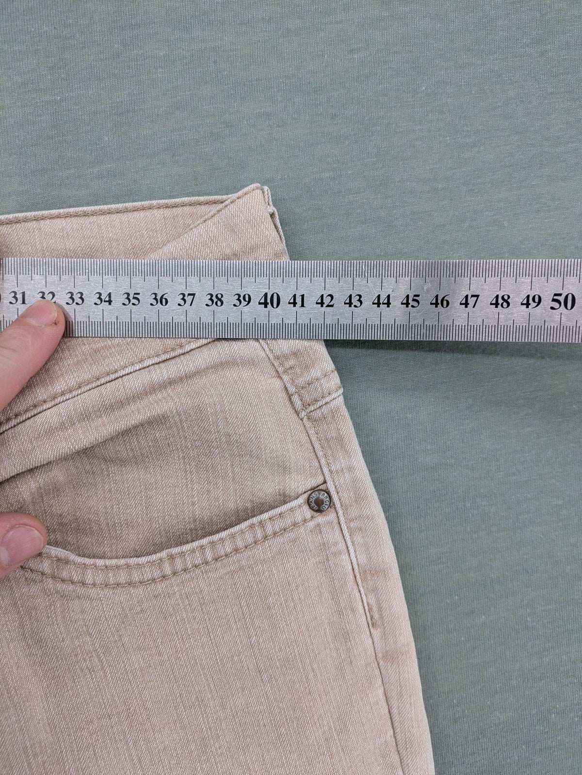 Angels beige straight leg jeans with five-pocket design and zipper button closure.