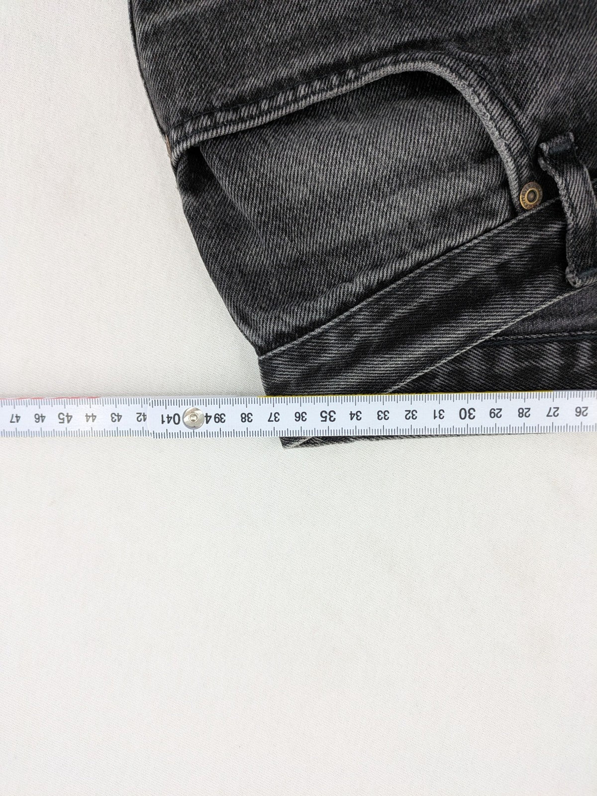 Maverick black straight jeans faded wash with iconic logo on back patch.