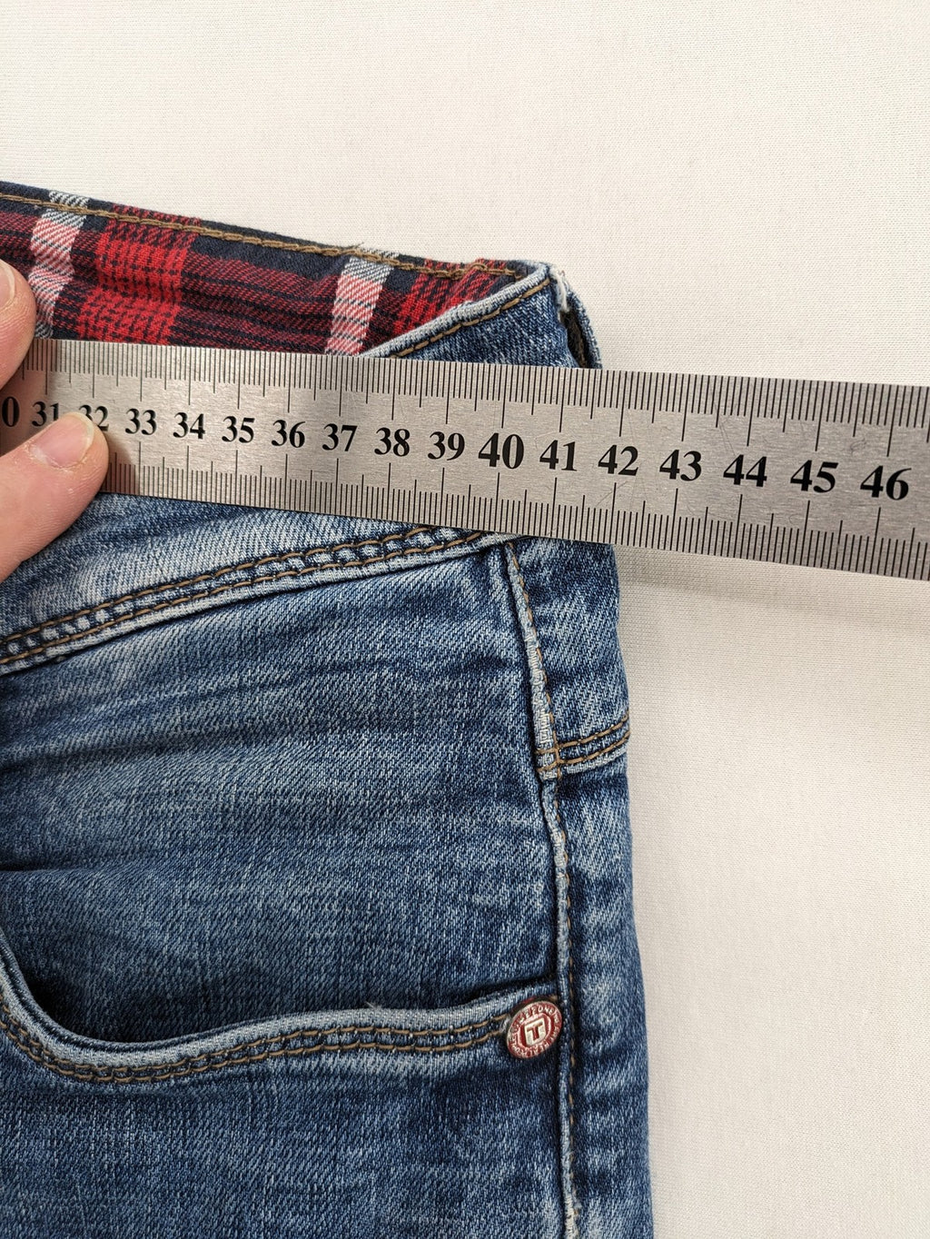 Timezone blue straight jeans slim fit with checkered pattern lining and button fly.