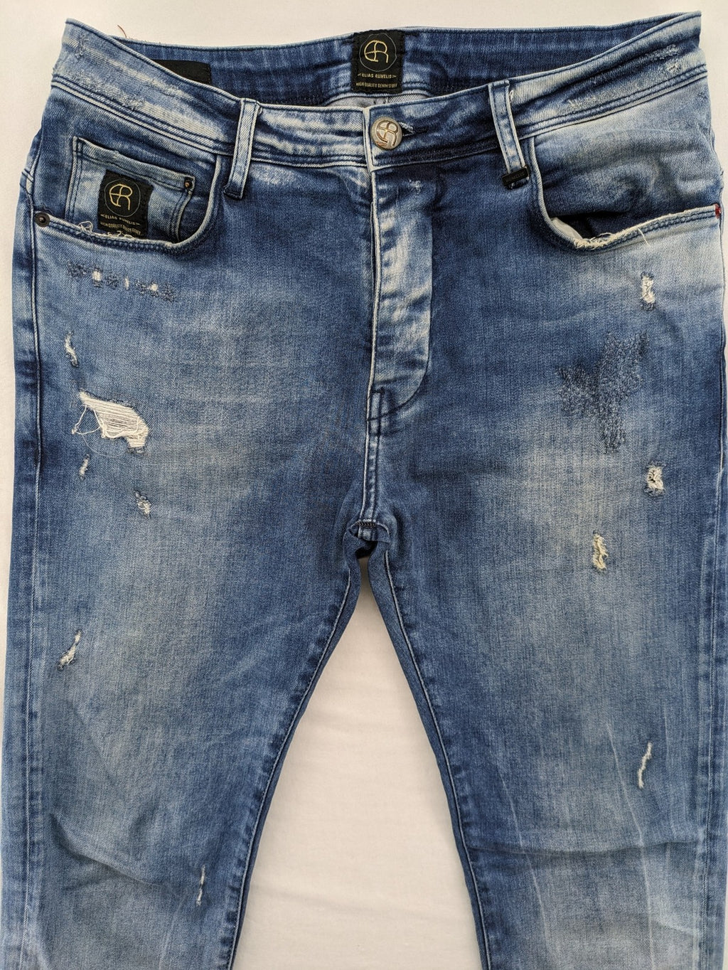 W32 blue straight jeans distressed details tapered fit button fly design