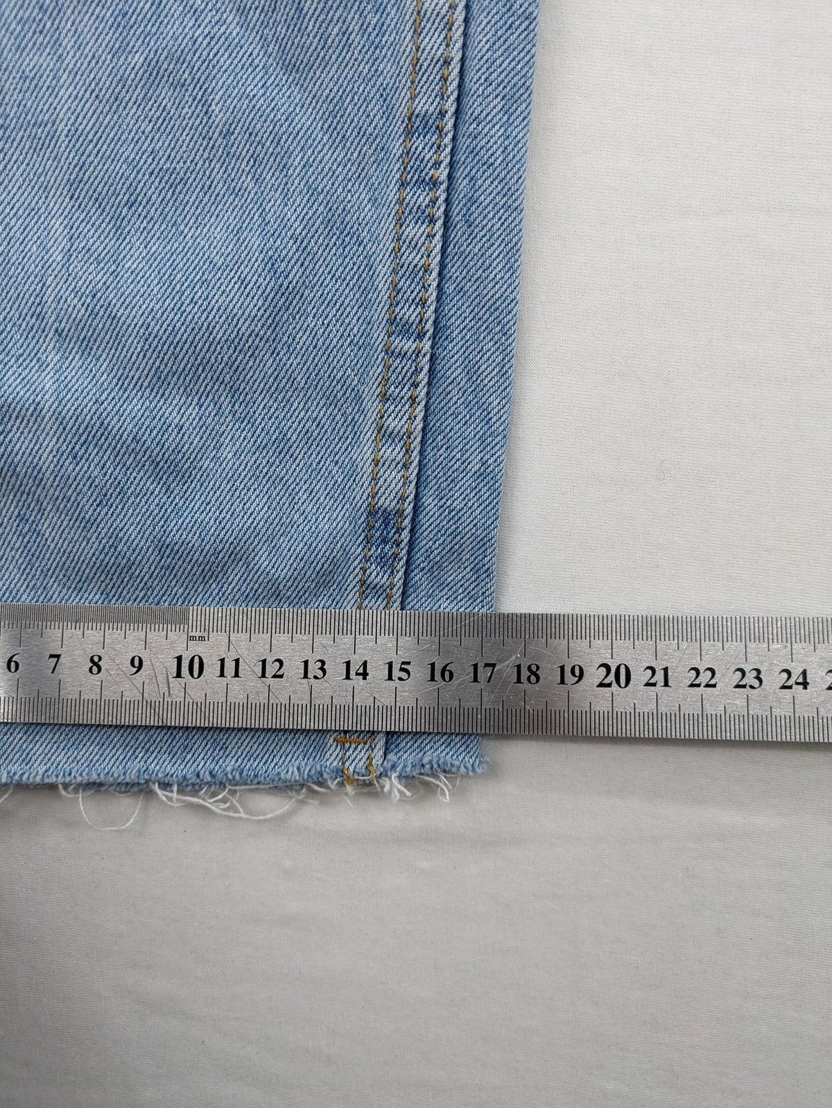 FB Sister blue straight leg jeans high rise with distressed detailing and button fly.