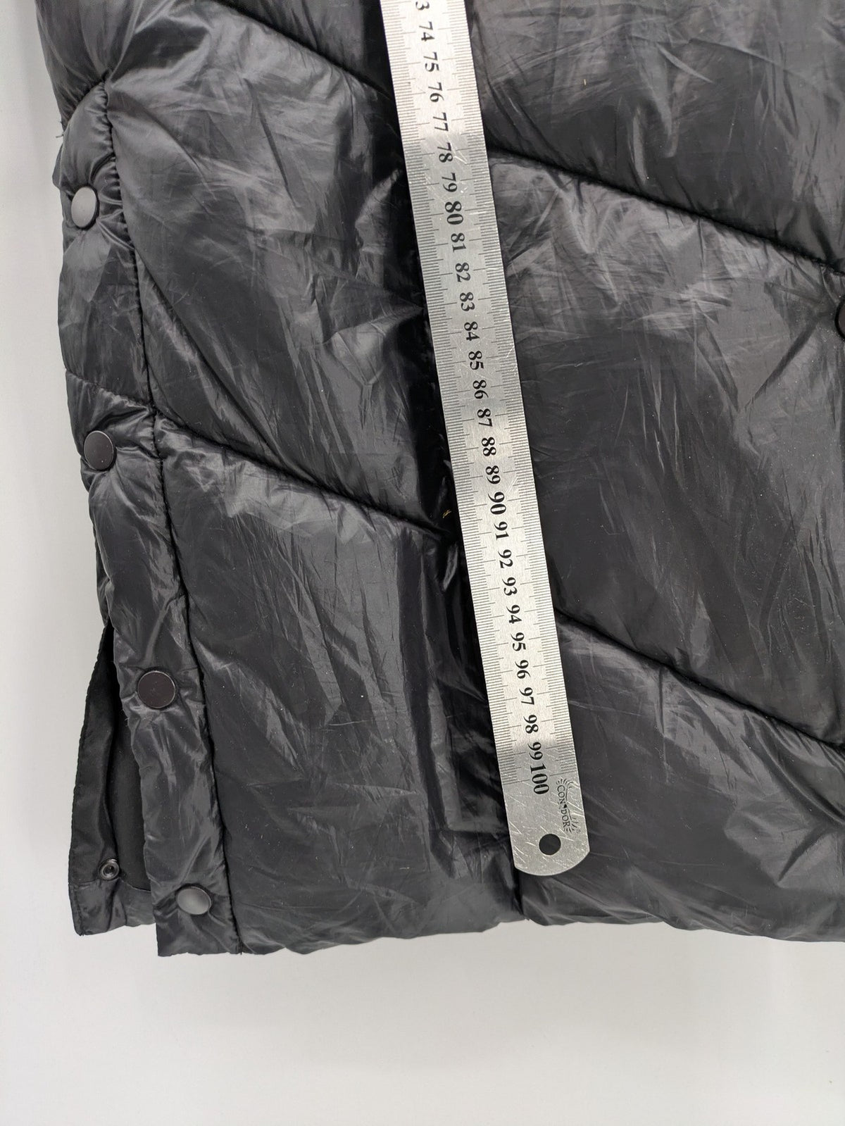 Stradivarius grey coat with chevron quilted pattern and hood, featuring zip closure and snap storm flap.