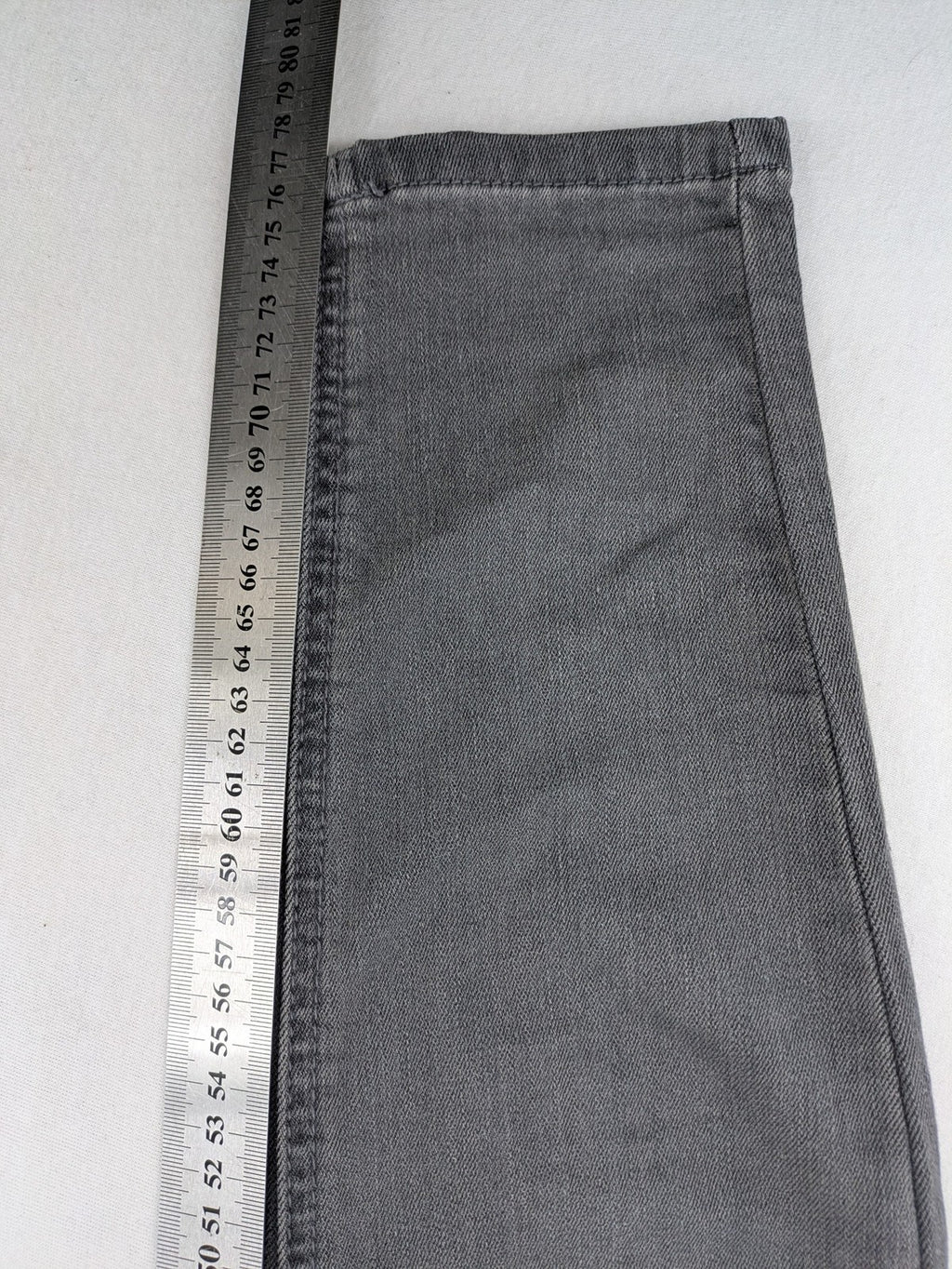 Buena Vista grey skinny jeans with button fly and stretch denim material.