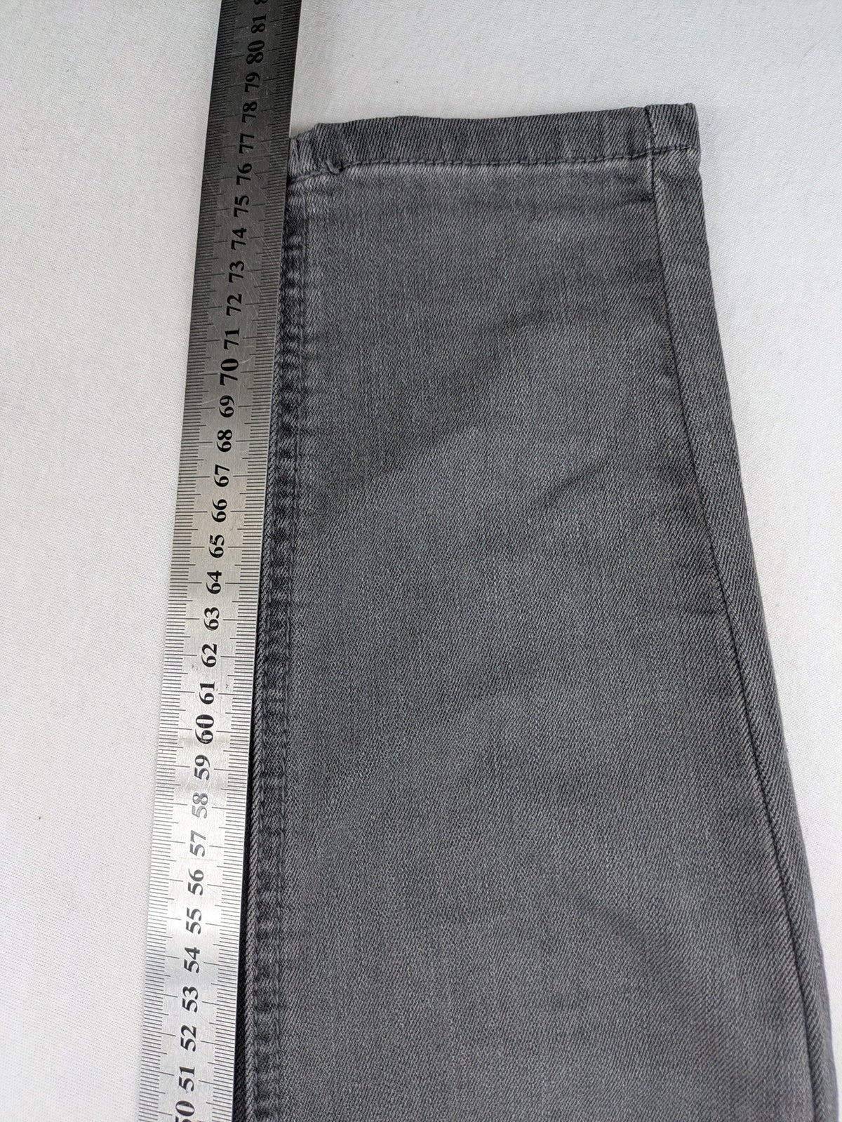 Buena Vista grey skinny jeans with button fly and stretch denim material.