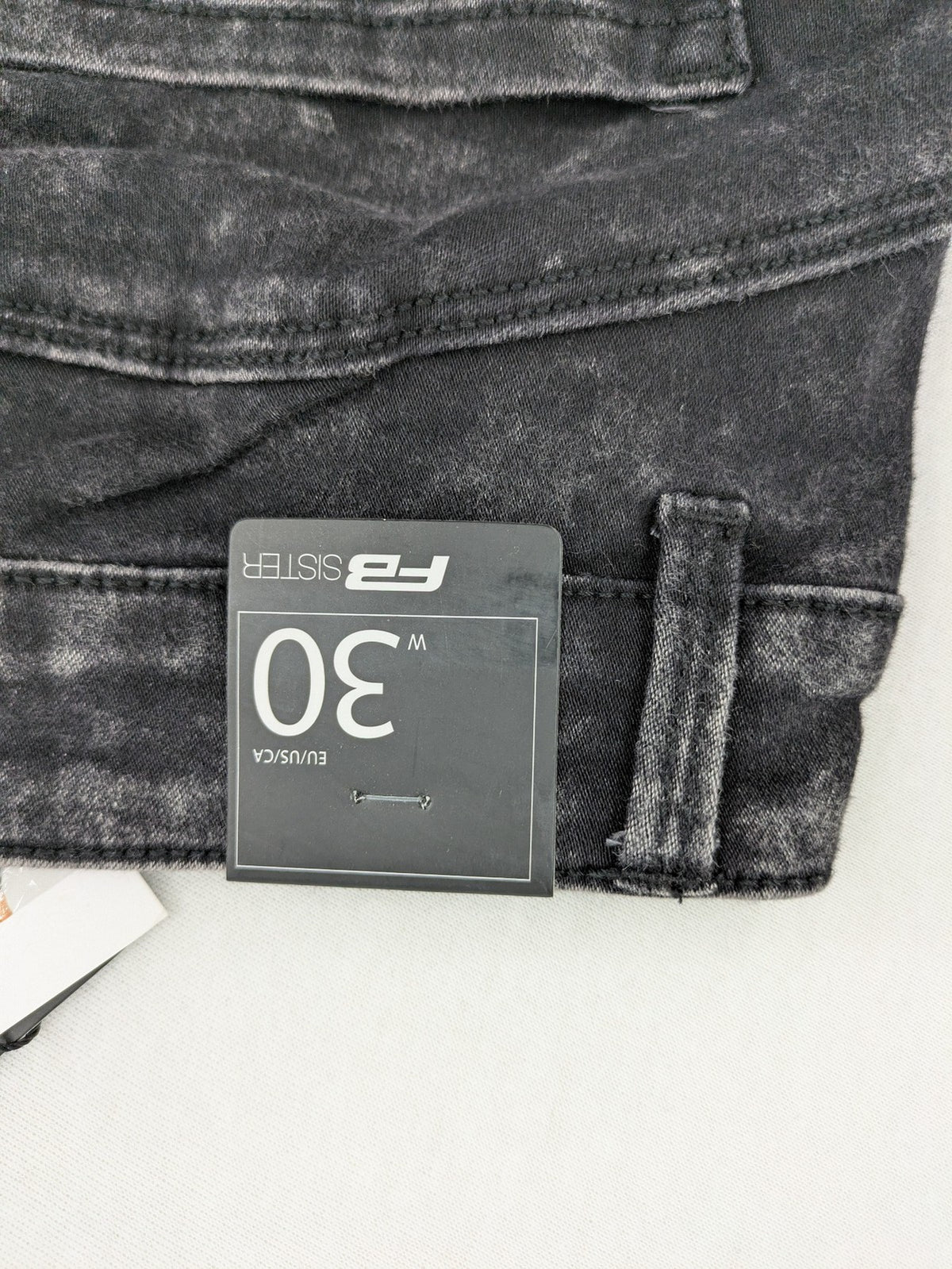 FB Sister skinny jeans black acid wash stretch denim with push-up design.