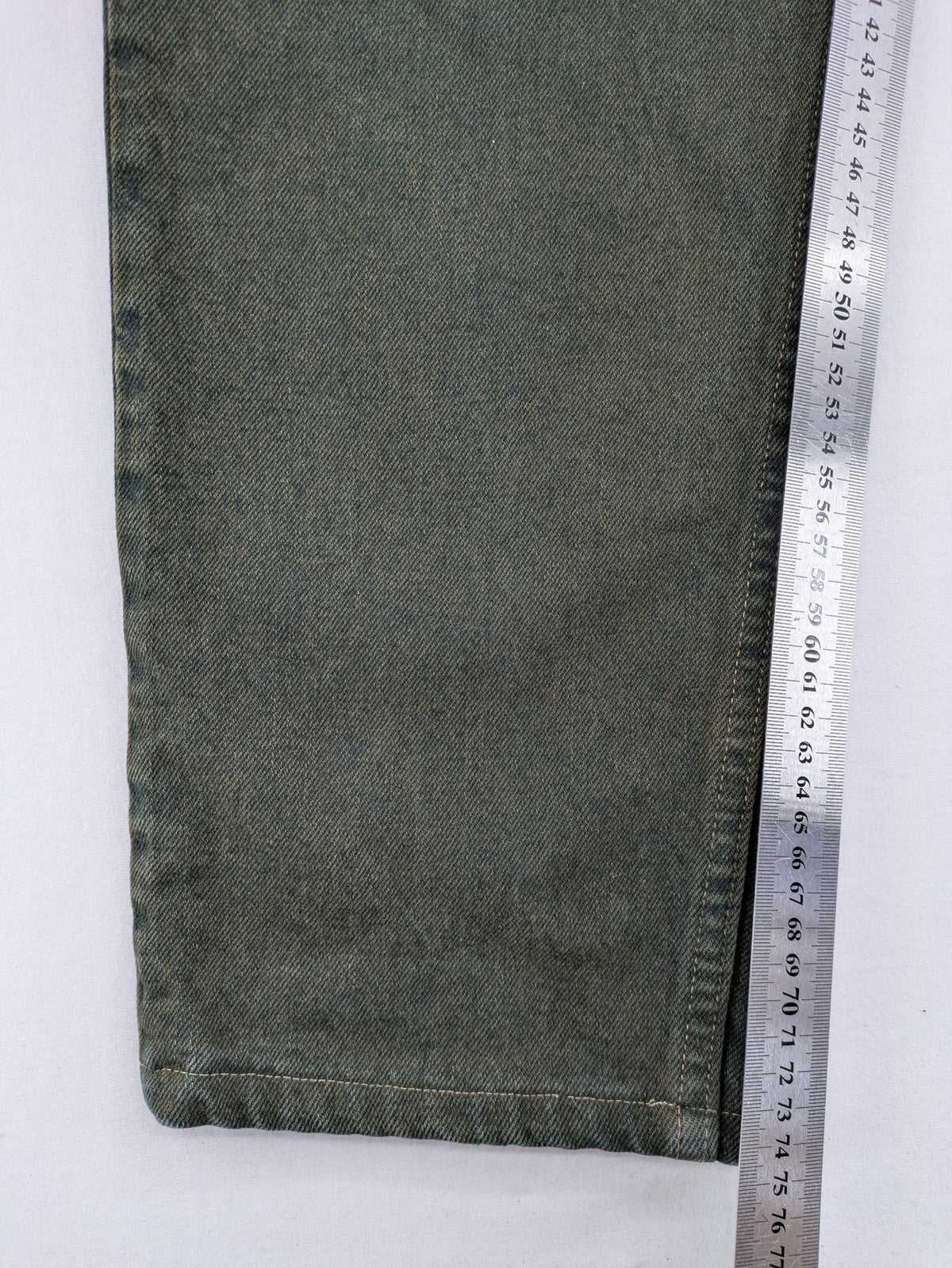 Levi's green 550 relaxed fit tapered jeans, vintage denim, made in USA.