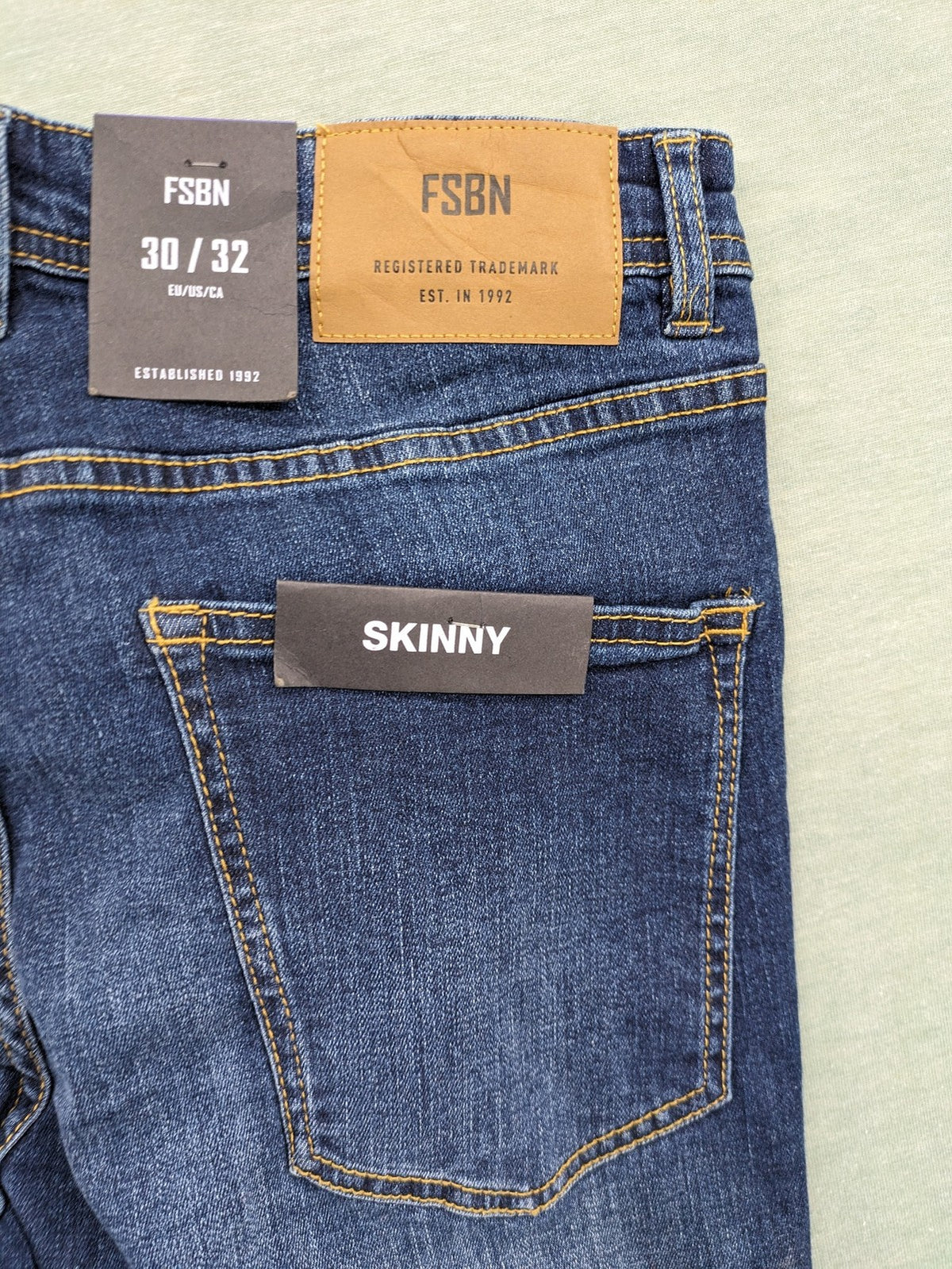 FSBN blue skinny jeans dark wash classic 5-pocket design with button closure