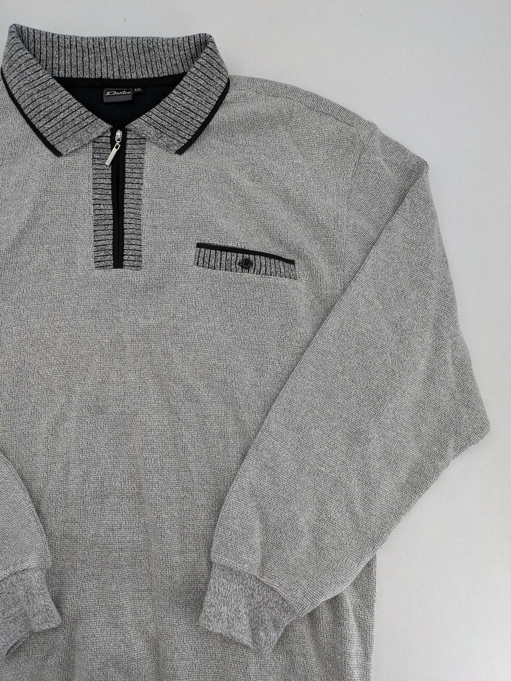 Danilo turtle neck jumper grey melange with black zipper and ribbed cuffs.