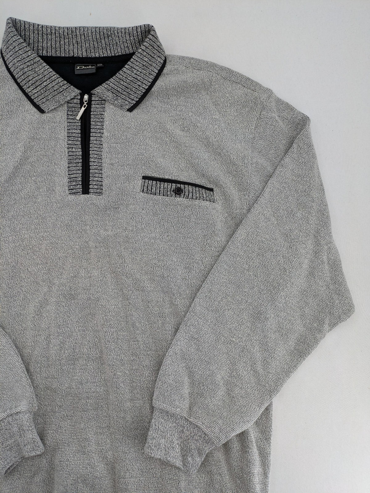 Danilo turtle neck jumper grey melange with black zipper and ribbed cuffs.