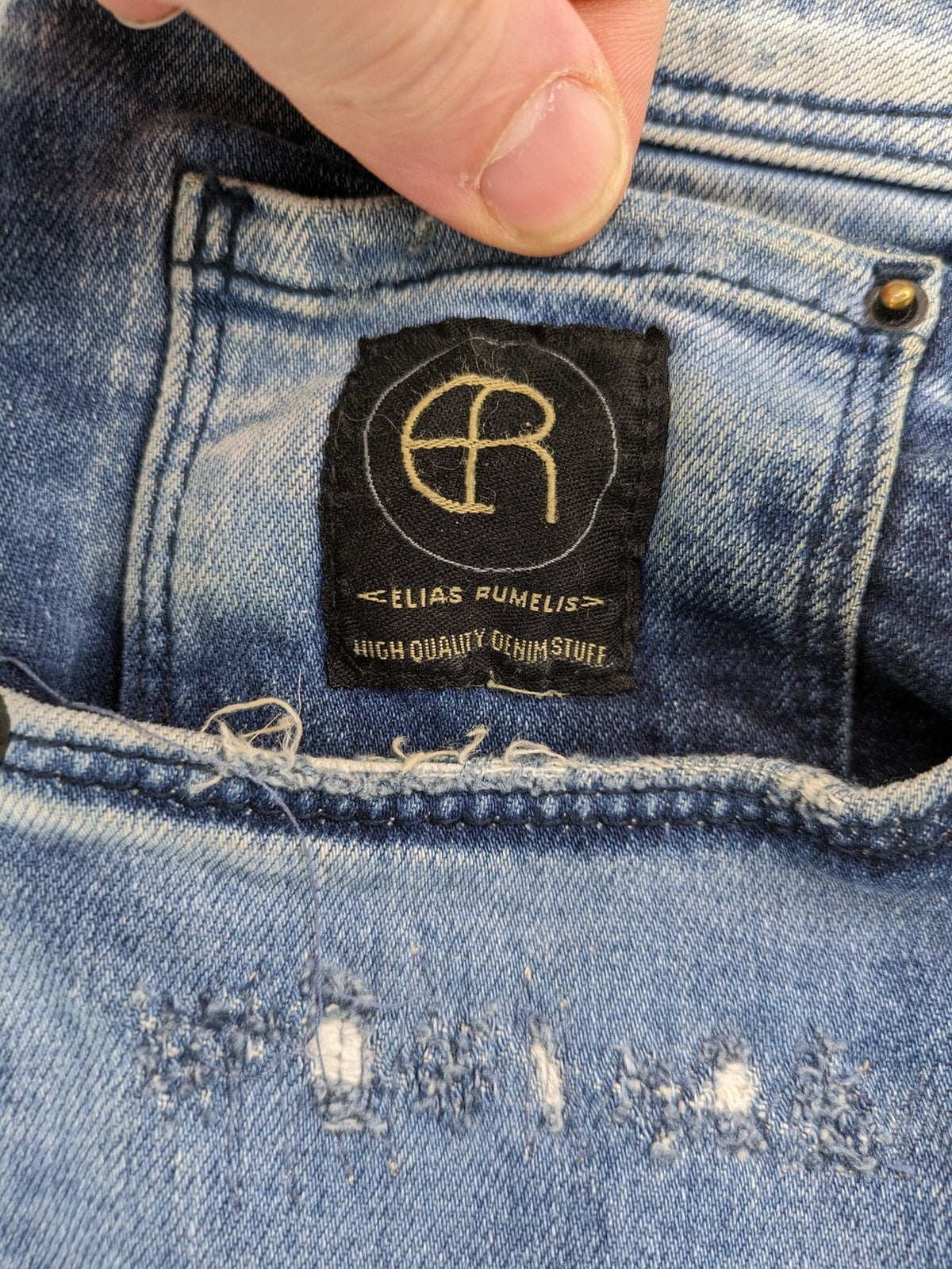 W32 blue straight jeans distressed details tapered fit button fly design