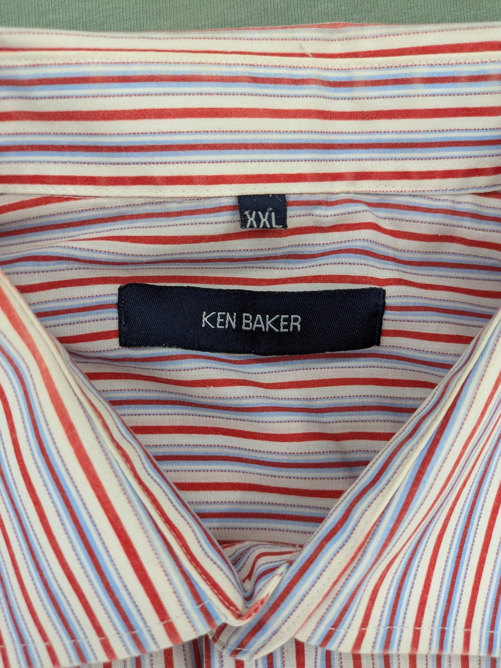 Ken Baker pink short sleeve shirt multicolored striped pattern with chest pocket and classic collar.
