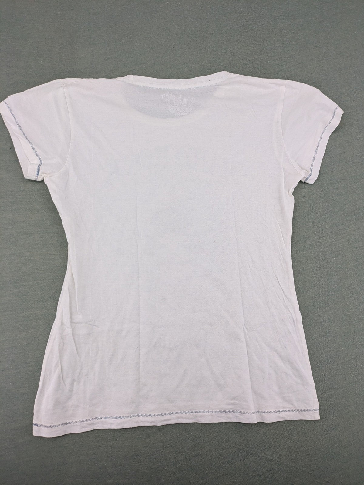 Hard Rock Cafe blue and white T-shirt with crown graphic and rhinestone accents.