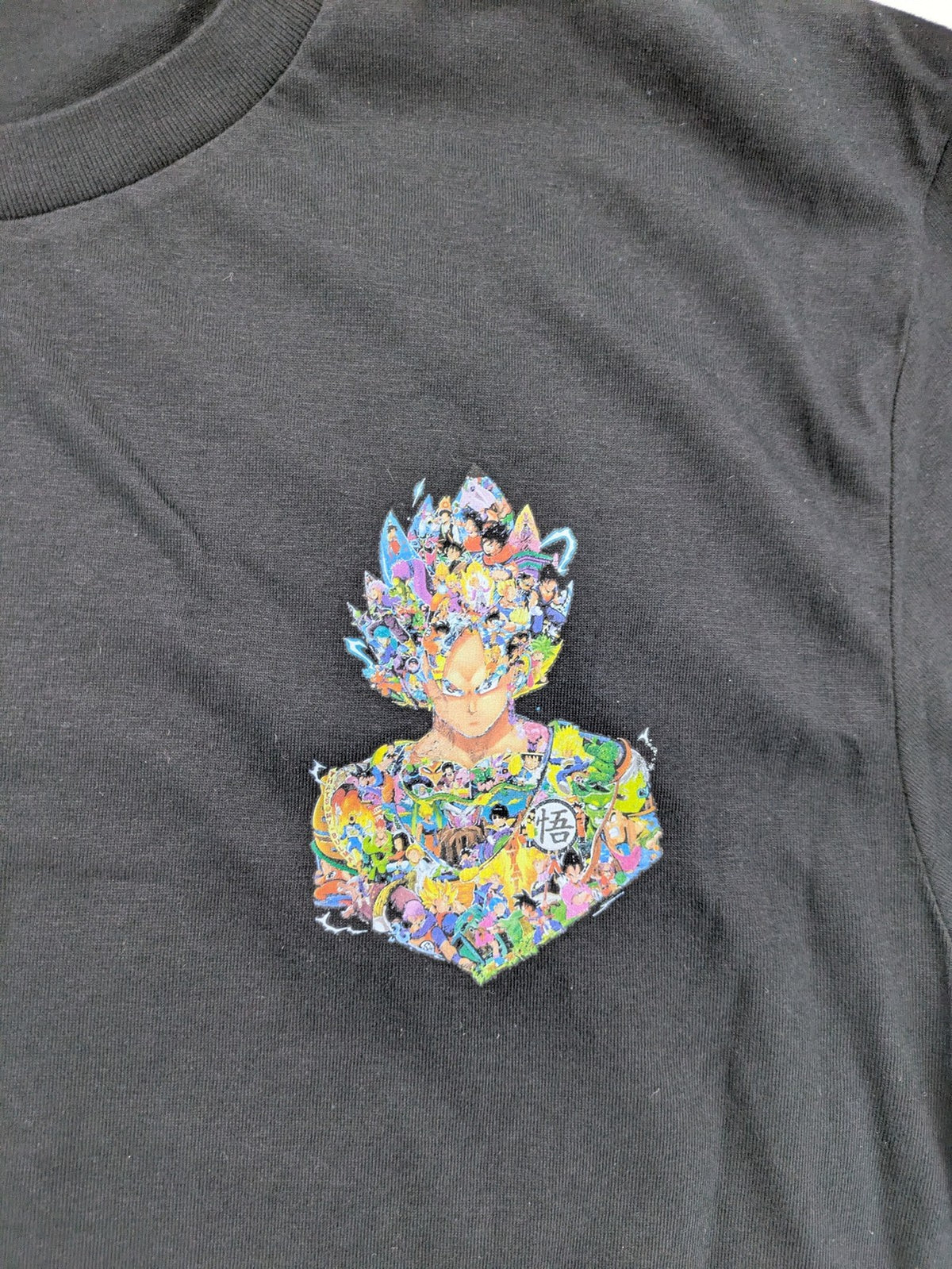 Dragon Ball Z grey t-shirt featuring Super Saiyajin Goku collage graphic design.