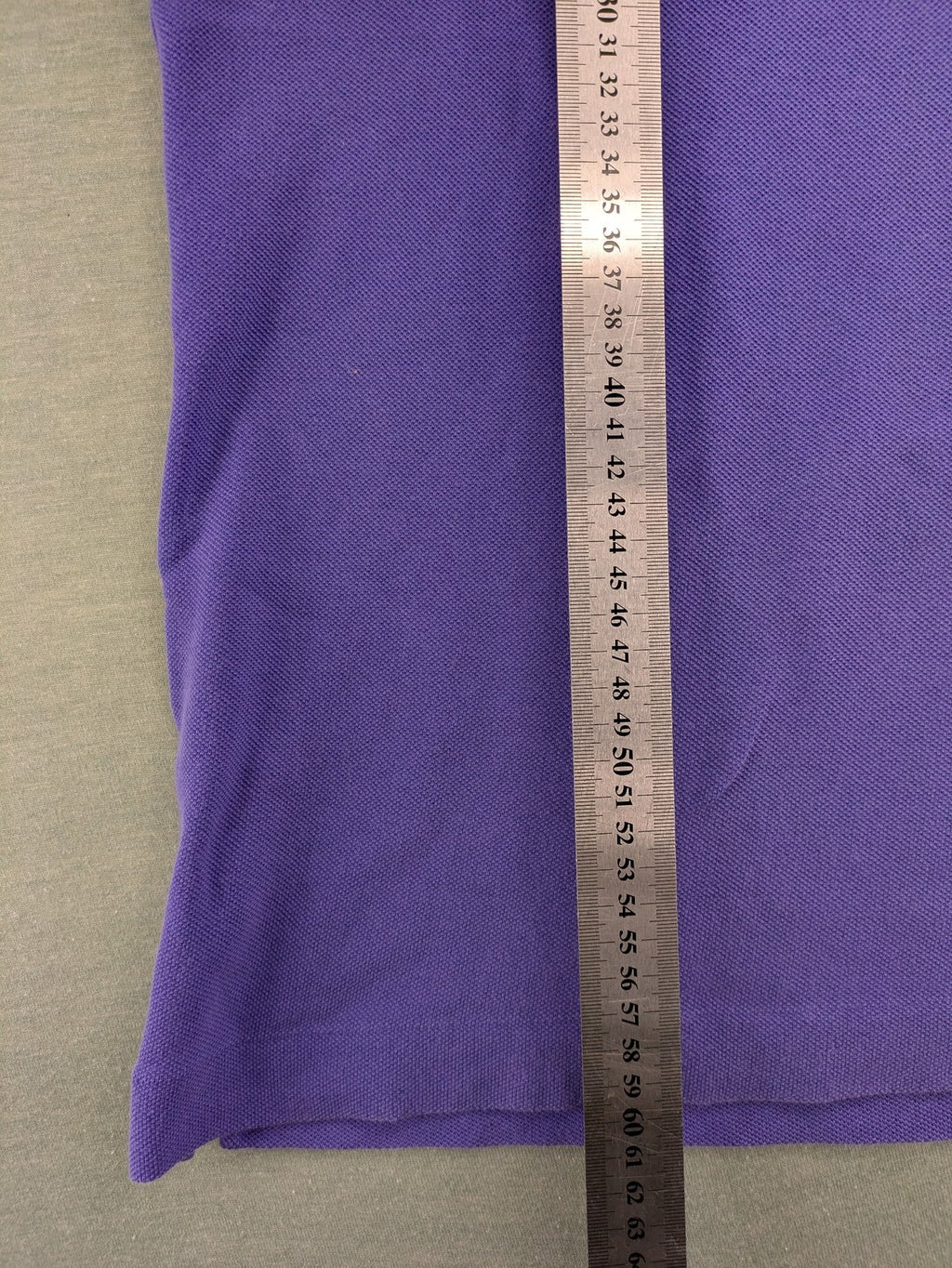 Lacoste purple polo shirt classic fit with embroidered crocodile logo and short sleeves.