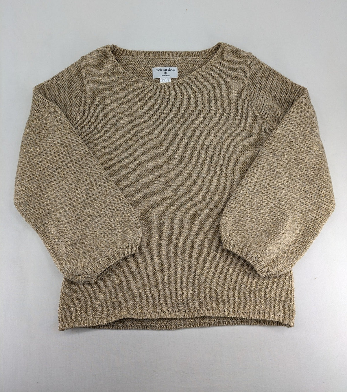 Rick Cardona beige turtle neck jumper with gold metallic thread and balloon sleeves.