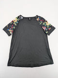 Emery Rose pink T-shirt with floral raglan sleeves and round neckline.