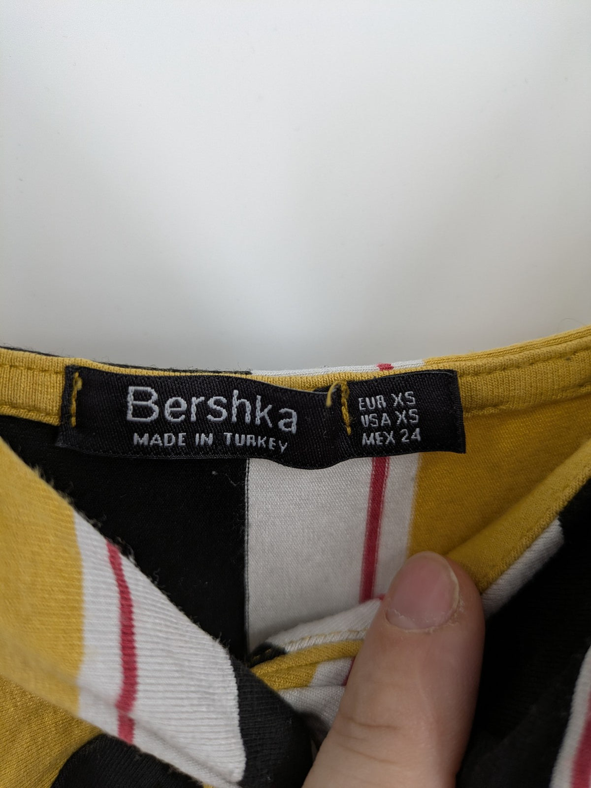 Bershka multi jumpsuit vertical striped pattern yellow, black, white, knot detail, cut-out waist.