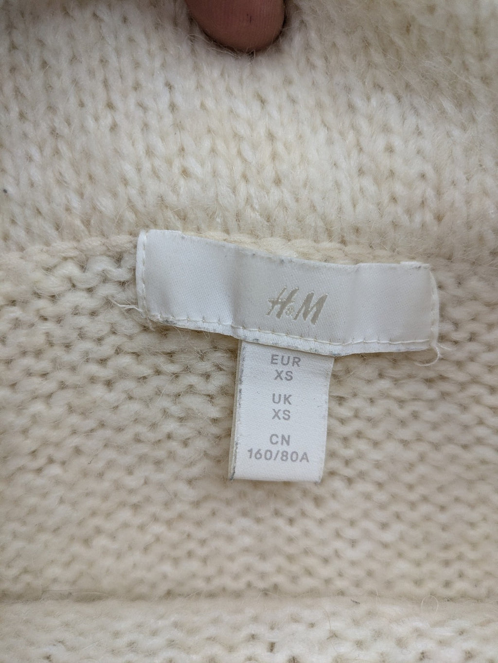 H&M beige turtle neck jumper soft alpaca blend off-shoulder design with wide collar.