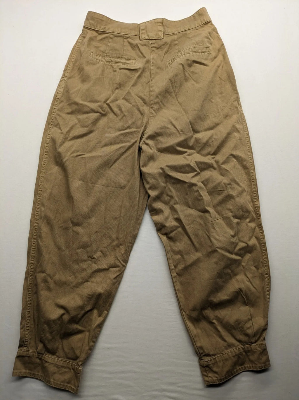 H&M beige tapered leg pants with pleats, high waist, 100% cotton, side pockets.