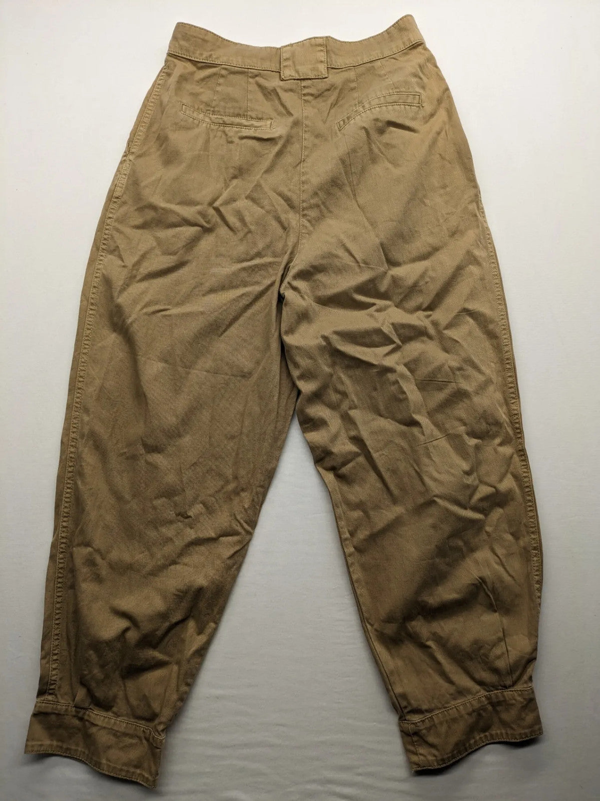 H&M beige tapered leg pants with pleats, high waist, 100% cotton, side pockets.
