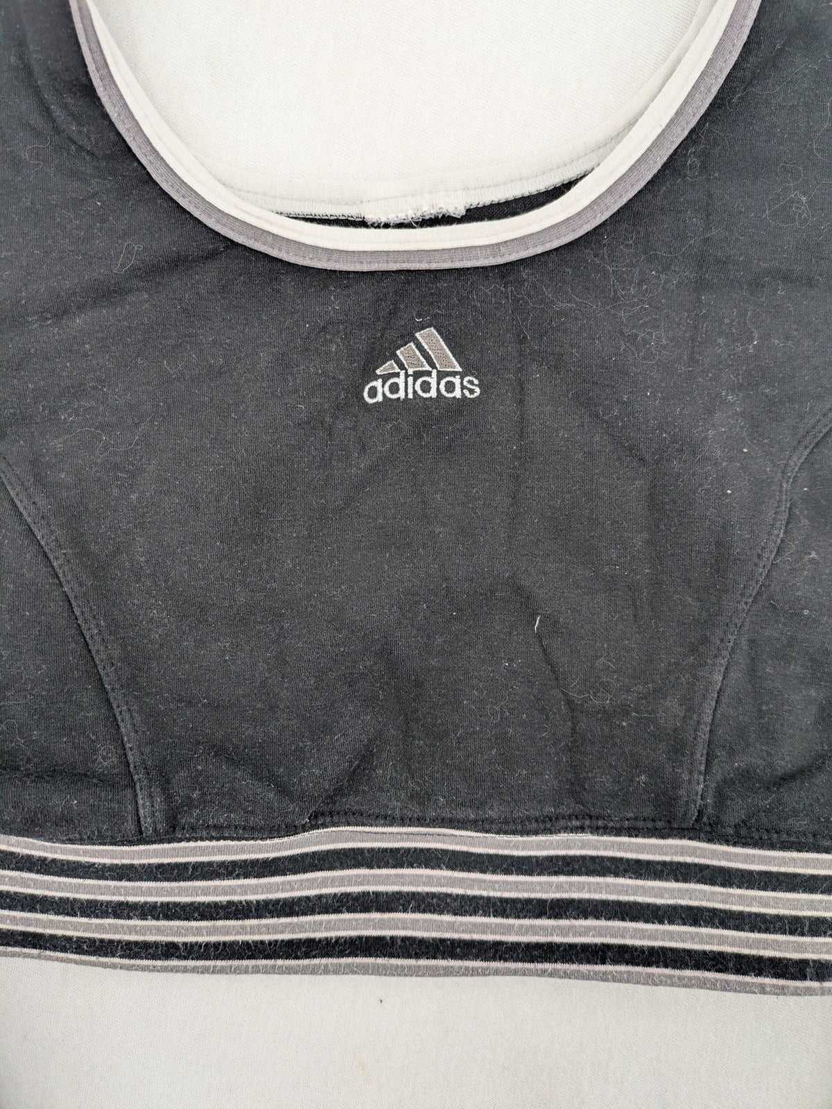 Adidas long sleeve crop top black grey white color-blocking with embroidered logo.