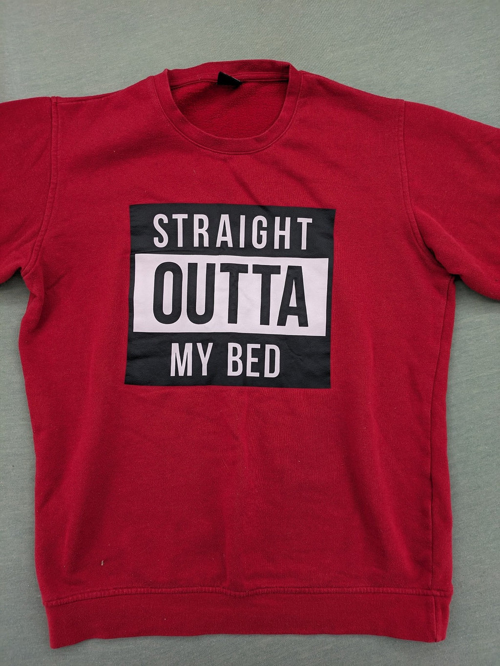 FSBN red turtle neck jumper with "Straight Outta My Bed" graphic print and slim fit.