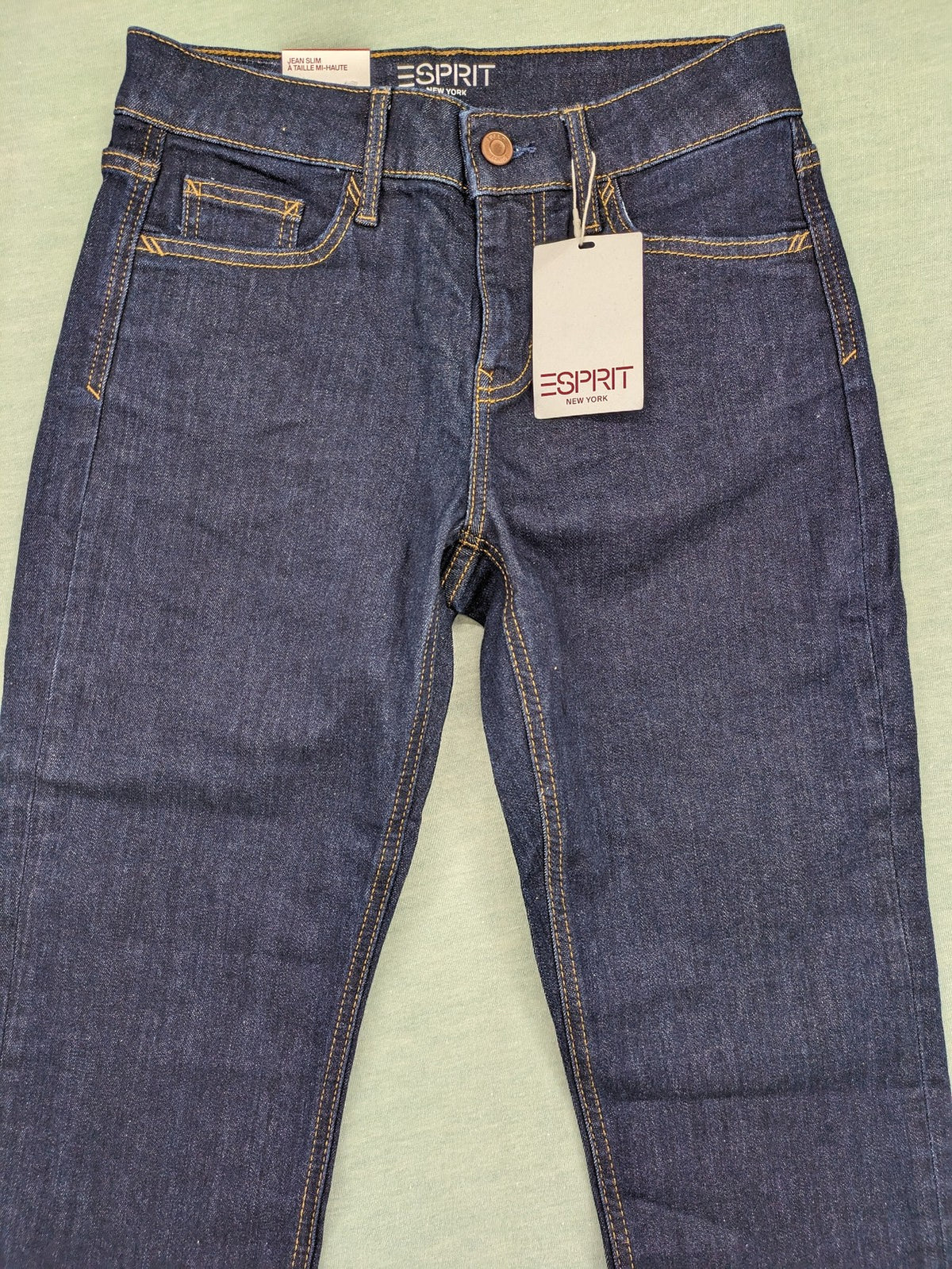Esprit navy straight jeans with five-pocket style and yellow contrast stitching.